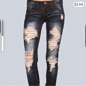 Machine plus size woman's distressed jeans